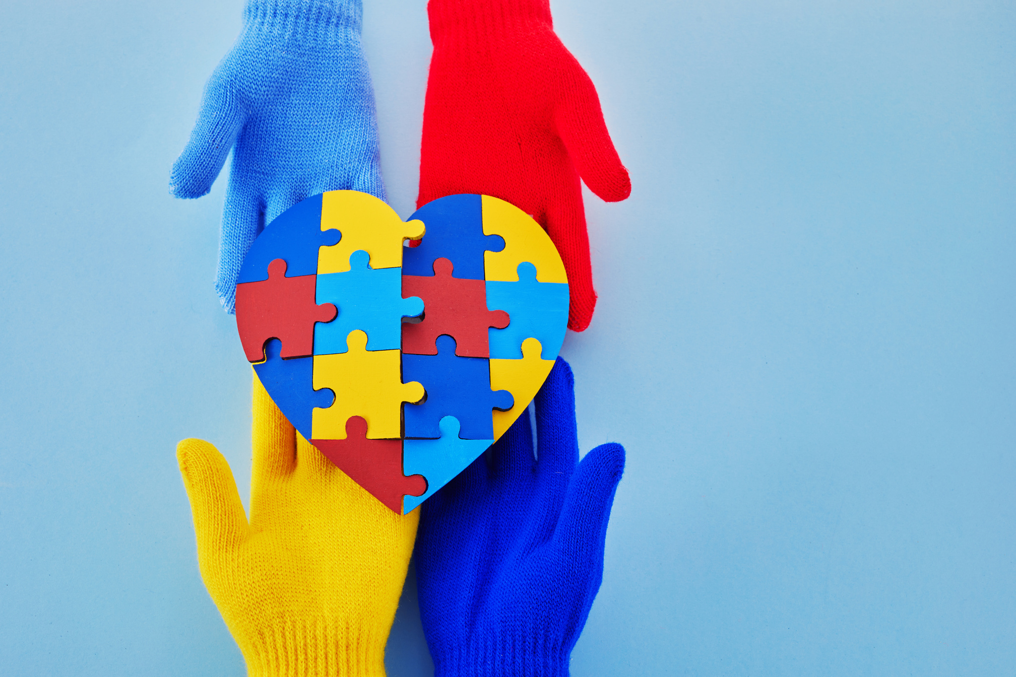 Hands Holding Jigsaw Puzzle Heart Shape, Autism Awareness, World Autism Awareness Day